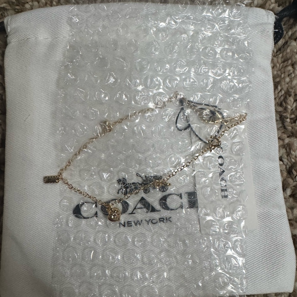 Coach Gold-Tone Charm Bracelet